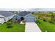 Areal view showing the manicured lawn and the beautiful landscaping at 6435 165Th E Dr, Parrish, FL 34219