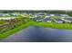 Enjoy peaceful water views from this lovely single-Gathering home in a desirable community at 6435 165Th E Dr, Parrish, FL 34219