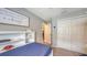 Bedroom featuring a bed, and double closets at 6435 165Th E Dr, Parrish, FL 34219