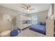 Bedroom with a bunk bed, twin bed, and neutral carpet at 6435 165Th E Dr, Parrish, FL 34219