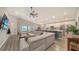 Open-concept living room featuring modern finishes and plenty of natural light at 6435 165Th E Dr, Parrish, FL 34219