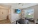 Comfortable living room with a ceiling fan, stylish furniture, and a window that provides ample natural light at 6435 165Th E Dr, Parrish, FL 34219