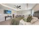Inviting main bedroom with a comfortable bed, large windows, and ample space for relaxation and enjoyment at 6435 165Th E Dr, Parrish, FL 34219