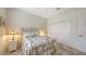 Charming bedroom with ceiling fan, double door closet and carpeted floors at 7012 Treymore Ct, Sarasota, FL 34243