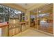 Covered patio boasts a built-in grill and mini fridge; perfect for outdoor entertaining at 7012 Treymore Ct, Sarasota, FL 34243