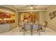 Screened-in patio provides dining and natural light at 7012 Treymore Ct, Sarasota, FL 34243