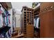 Walk-in closet with built-in shoe racks, shelves, and hanging space at 7211 Pasadena Gln, Lakewood Ranch, FL 34202