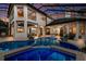 Screened pool area with brick pavers, spa, and view of the home's exterior at 7211 Pasadena Gln, Lakewood Ranch, FL 34202