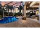 Screened pool area with brick pavers, spa, and lounge area offers a relaxing outdoor experience at 7211 Pasadena Gln, Lakewood Ranch, FL 34202