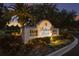 Entrance sign to Palmer's Creek community with decorative landscaping and lighting at 7211 Pasadena Gln, Lakewood Ranch, FL 34202