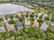 Aerial view of this house with a private pool in a beautiful neighborhood near a lake at 7424 Sea Island Ln, Bradenton, FL 34201
