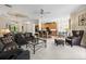 Spacious living area featuring an open floor plan connecting to the dining and kitchen, perfect for entertaining at 7424 Sea Island Ln, Bradenton, FL 34201