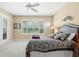 Bright main bedroom with plantation shutters, neutral walls, and a peaceful ambiance at 7424 Sea Island Ln, Bradenton, FL 34201