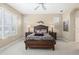 Cozy bedroom featuring neutral tones, plantation shutters, and elegant decor at 7424 Sea Island Ln, Bradenton, FL 34201