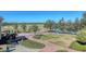 An aerial view that shows off the golf course and the community landscaping at 7717 Us Open Loop, Lakewood Ranch, FL 34202