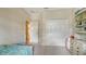 Bright bedroom with a large closet, neutral paint, and plush carpeting at 7717 Us Open Loop, Lakewood Ranch, FL 34202