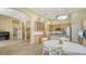 Open kitchen features stainless appliances, light wood cabinets, and breakfast area at 7717 Us Open Loop, Lakewood Ranch, FL 34202