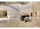 Impressive lobby boasts a grand staircase, high ceilings, and a beautiful marble floor at 7717 Us Open Loop, Lakewood Ranch, FL 34202