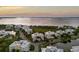 An aerial view of the condo community at sunset at 7840 34Th Ave W # 303, Bradenton, FL 34209