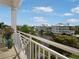 Community view from private balcony, with seating and plants at 7840 34Th Ave W # 303, Bradenton, FL 34209