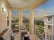 Picturesque balcony offering stunning views, comfortable seating, and a tranquil outdoor space at 7840 34Th Ave W # 303, Bradenton, FL 34209