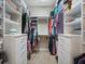 An organized walk-in closet with custom shelving and plenty of storage space at 7840 34Th Ave W # 303, Bradenton, FL 34209