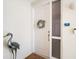 Charming entryway with a decorative wreath and a heron statue adding a touch of elegance at 7840 34Th Ave W # 303, Bradenton, FL 34209