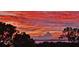 Beautiful sunset view over the water behind the homes, highlighting the community's serene beauty at 7840 34Th Ave W # 303, Bradenton, FL 34209