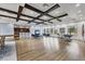 Large recreation area with a lounge and dining space, featuring a kitchen, game tables, and plenty of seating at 7930 111Th Ter E, Parrish, FL 34219