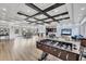 Spacious clubhouse with games, tv, dining area, and bar for resident activities and socializing at 7930 111Th Ter E, Parrish, FL 34219