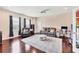 Spacious living area with a home theater system, comfortable seating, and a bright, open atmosphere for entertainment at 7930 111Th Ter E, Parrish, FL 34219