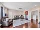 Versatile living room with a home theater setup, comfortable seating, and adjacent workout area, perfect for relaxation at 7930 111Th Ter E, Parrish, FL 34219