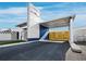 Modern commercial building featuring a sleek design with a covered entrance and ample parking at 8100 Ciboney Ct # 10, Sarasota, FL 34240