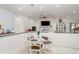 Eat-in dining area with tile floors, modern lighting, and decorative accents at 9007 63Rd Avenue E Dr, Bradenton, FL 34202