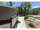 Charming house exterior showcases meticulous landscaping and welcoming walkway at 9007 63Rd Avenue E Dr, Bradenton, FL 34202