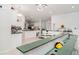 Open-concept living space with bright lighting and views to the dining and kitchen areas at 9007 63Rd Avenue E Dr, Bradenton, FL 34202