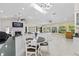 Open living space with tile floors, fireplace, and lots of windows bringing in natural light at 9007 63Rd Avenue E Dr, Bradenton, FL 34202