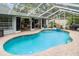 Beautiful pool area with screened enclosure, and outdoor kitchen at 9007 63Rd Avenue E Dr, Bradenton, FL 34202