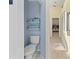 Bathroom featuring a toilet and shelving at 9007 63Rd Avenue E Dr, Bradenton, FL 34202