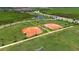 Aerial shot of the community baseball fields featuring manicured fields and surrounded by beautiful Florida landscaping at 10254 Morning Mist Ln, Sarasota, FL 34241