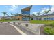 Stunning clubhouse exterior with modern architectural design, professional landscaping, and inviting entrance at 10254 Morning Mist Ln, Sarasota, FL 34241