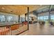 A bright and airy clubhouse offers a comfortable lounge area and bar with ample seating and a modern design at 10254 Morning Mist Ln, Sarasota, FL 34241