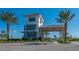 Beautiful community entrance to this neighborhood with lush landscaping at 10254 Morning Mist Ln, Sarasota, FL 34241