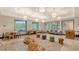 Spacious game room featuring tables, seating, and a variety of games at 10254 Morning Mist Ln, Sarasota, FL 34241