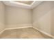 Well-lit living room featuring decorative ceiling trim and recessed lighting at 10254 Morning Mist Ln, Sarasota, FL 34241