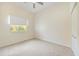 Bright bedroom with window and carpeted floors providing a comfortable and inviting atmosphere at 1064 N Tamiami Trl # 1125, Sarasota, FL 34236