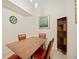 The dining room features a wooden table with seating for four at 1064 N Tamiami Trl # 1125, Sarasota, FL 34236