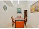 The dining room features a wooden table with seating for four at 1064 N Tamiami Trl # 1125, Sarasota, FL 34236
