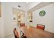The dining room features a wooden table with seating for four at 1064 N Tamiami Trl # 1125, Sarasota, FL 34236
