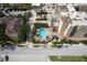 Overhead view of a shared outdoor swimming pool and patio area at 1064 N Tamiami Trl # 1125, Sarasota, FL 34236